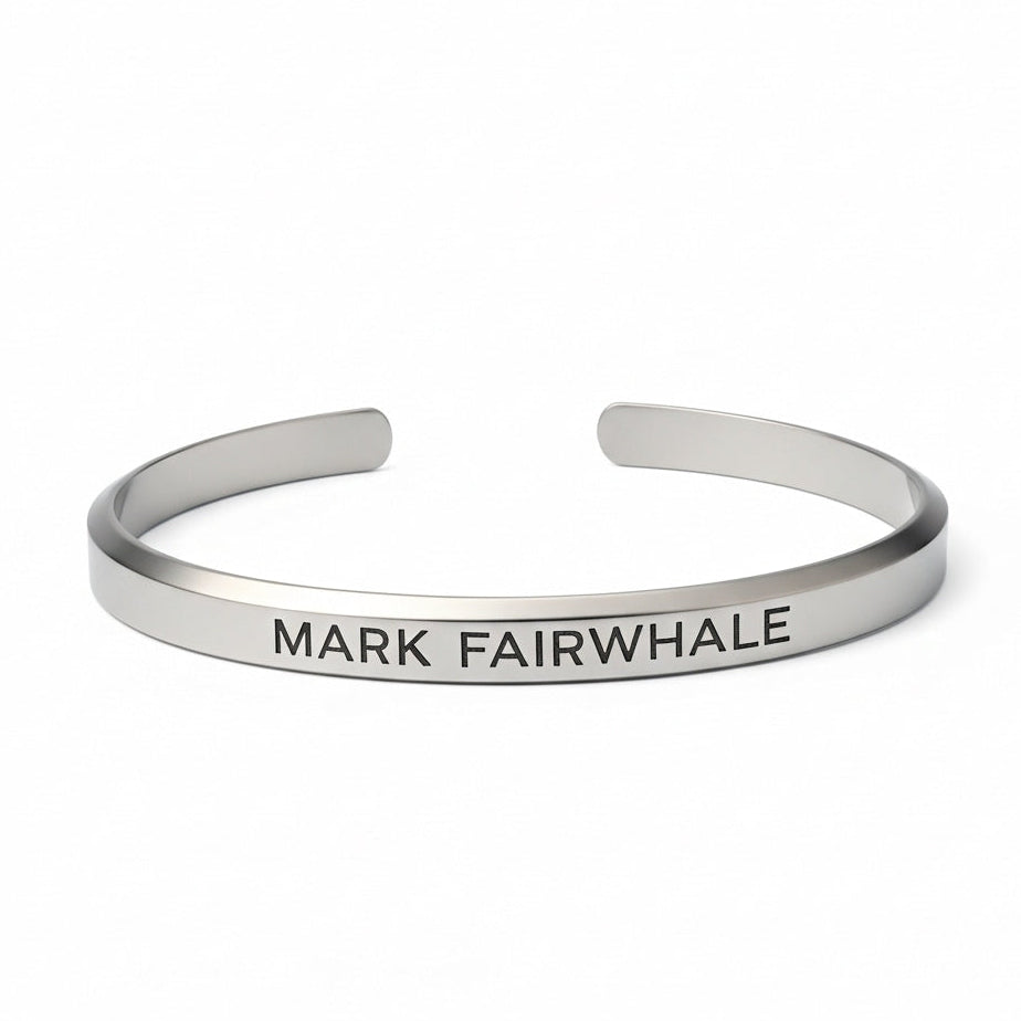 Mark Fairwhale silver cuff bracelet with engraved logo on white background