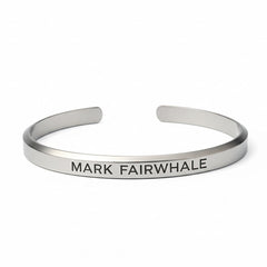 Mark Fairwhale silver cuff bracelet with engraved logo on white background
