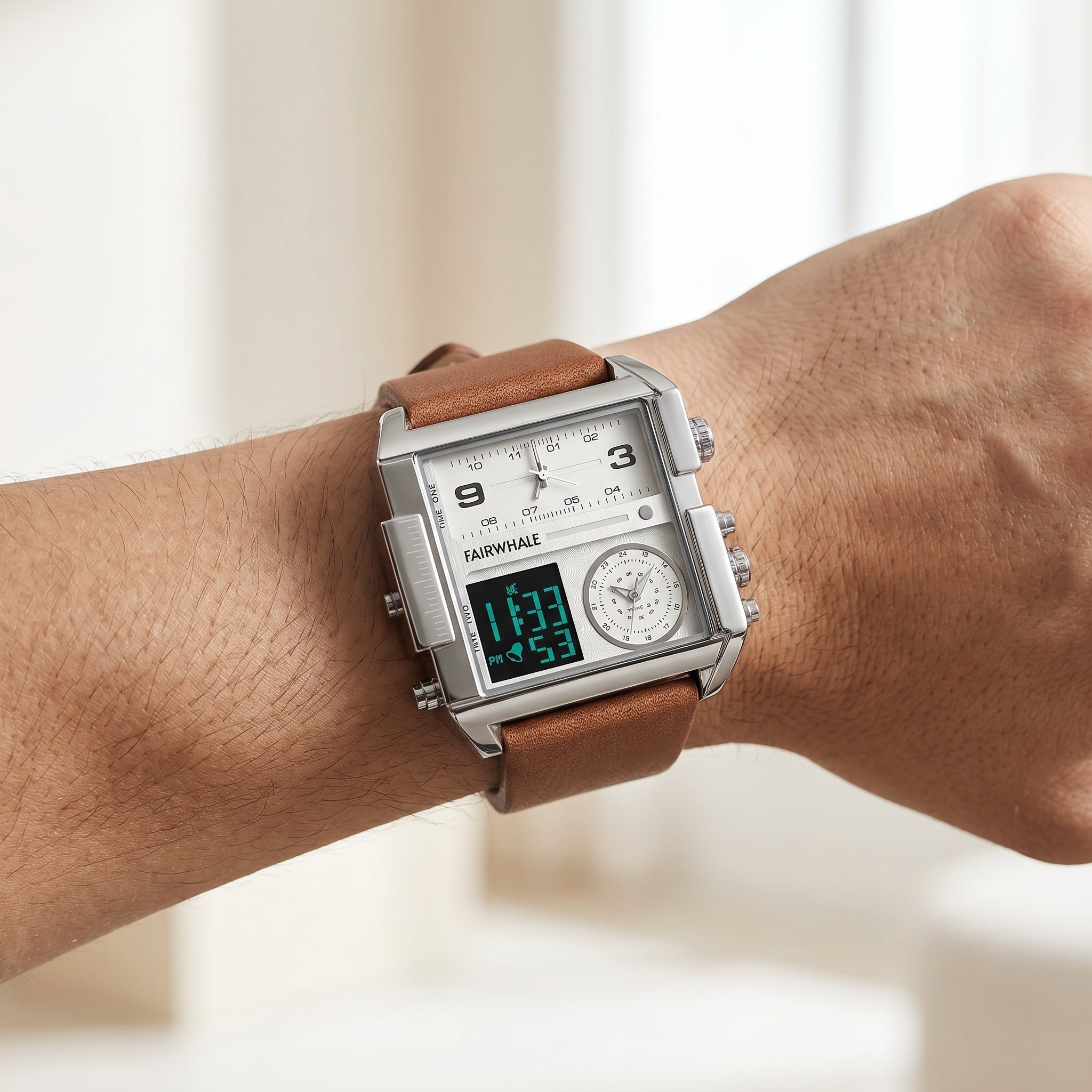 Mark Fairwhale silver multi-display watch with brown leather strap on wrist