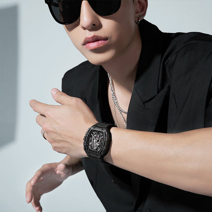 Model wearing Mark Fairwhale FW-6650 TRIONATO men’s skeleton automatic watch with black case and