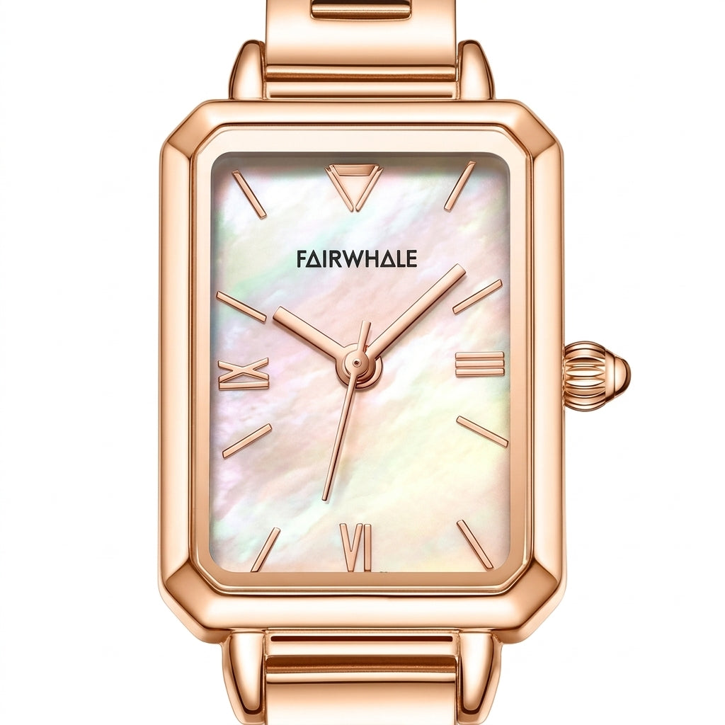 Rose gold watch with a white face on a white background