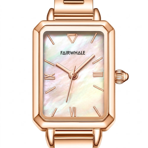 Rose gold watch with a white face on a white background
