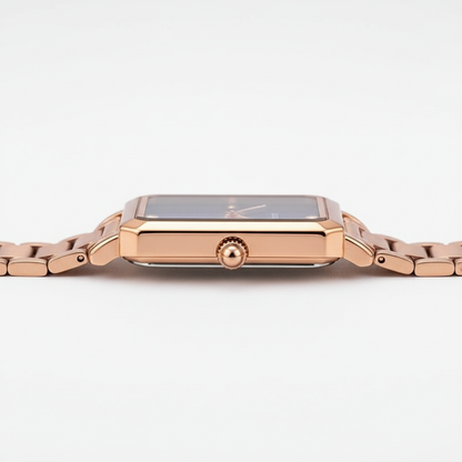 Rose gold watch on a white background