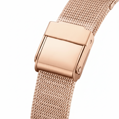 Rose gold watch strap on a white background