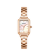 Rose gold watch with a white face on a white background