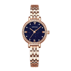 Rose gold watch with a blue face on a white background