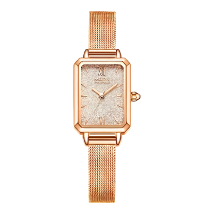 Rose gold watch with a black background