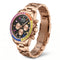 Rose gold watch with a colorful bezel on a white background