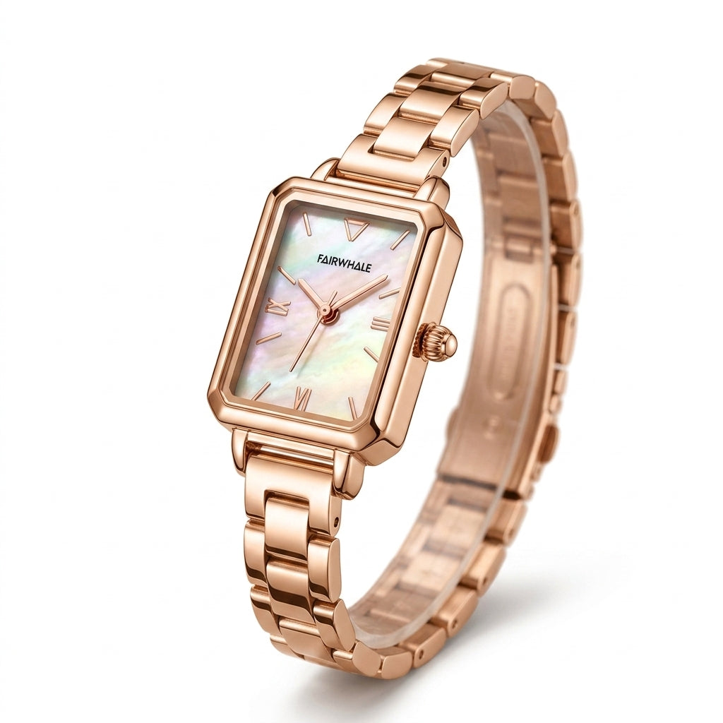 Rose gold watch with a white face on a white background