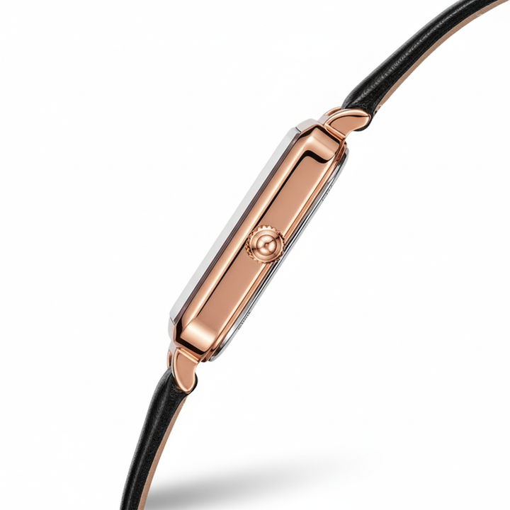 Rose gold watch with black strap on a white background