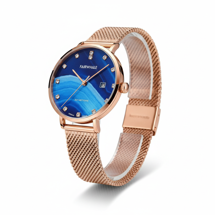 Rose gold watch with blue dial on a white background