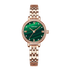Rose gold watch with green face and diamond accents on a white background