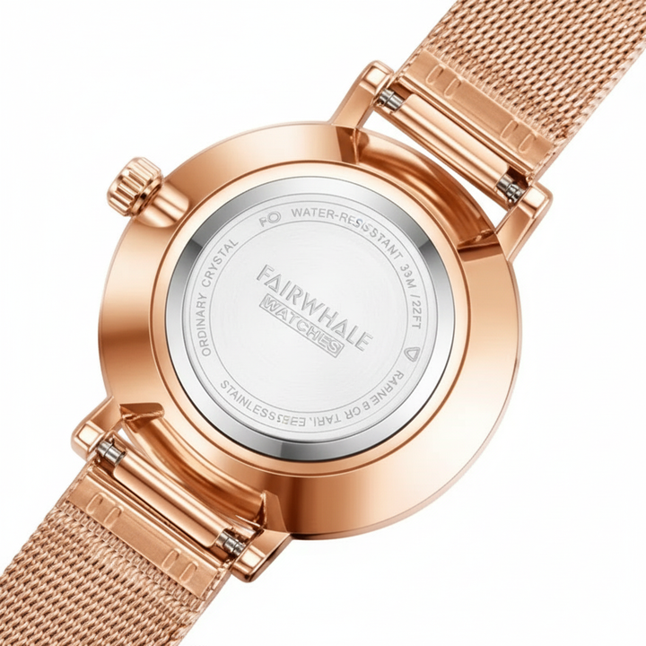 Rose gold watch with visible brand name on a white background