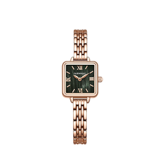 Rose gold watch with a green face on a white background