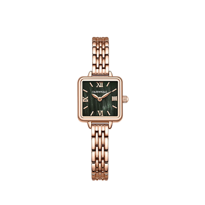 Rose gold watch with a green face on a white background