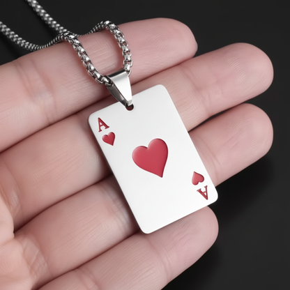 Mark Fairwhale silver Ace of Hearts card pendant necklace held in hand