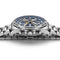 Silver watch with a blue face on a white background