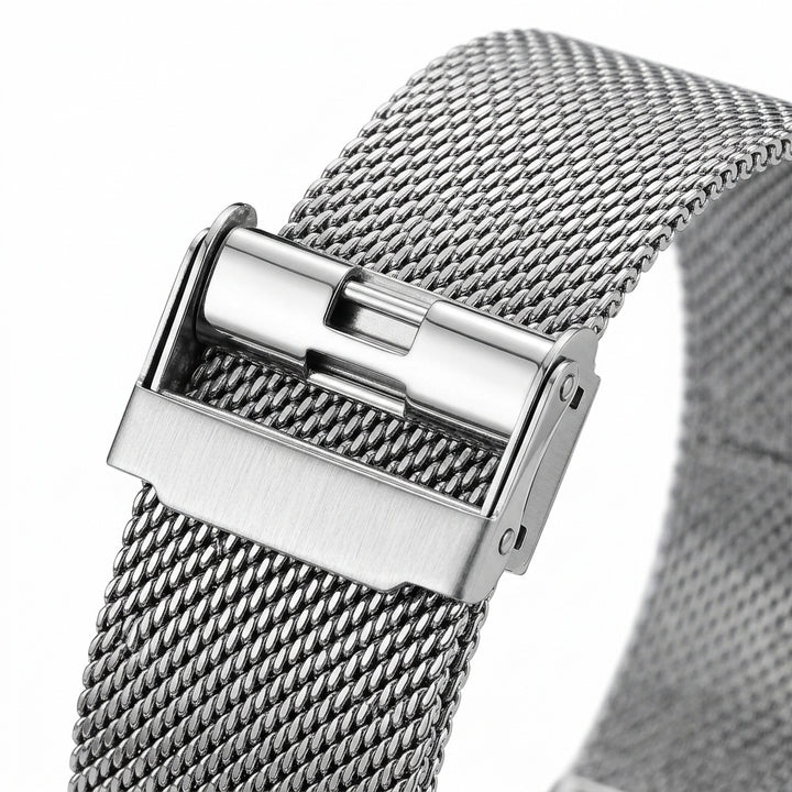 Silver mesh watch strap with a clasp on a white background