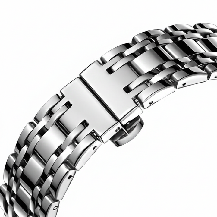 Silver metal watch strap on a white background