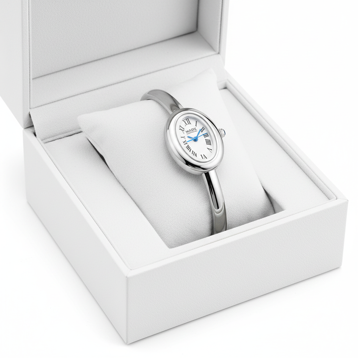 Silver watch in a white box on a white background