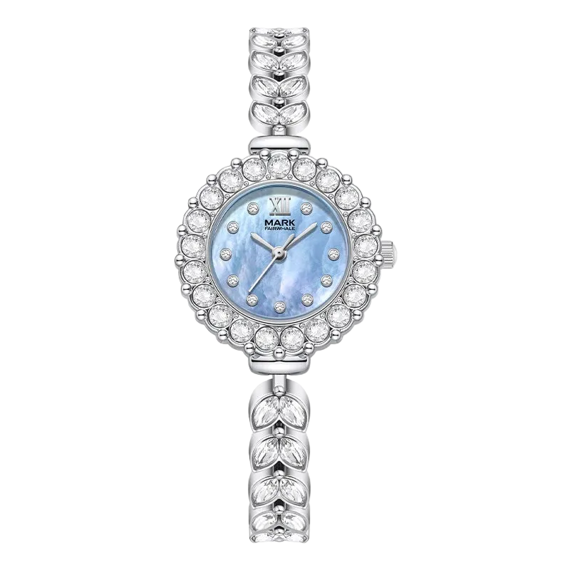 Silver watch with a blue face and crystal embellishments on a white background