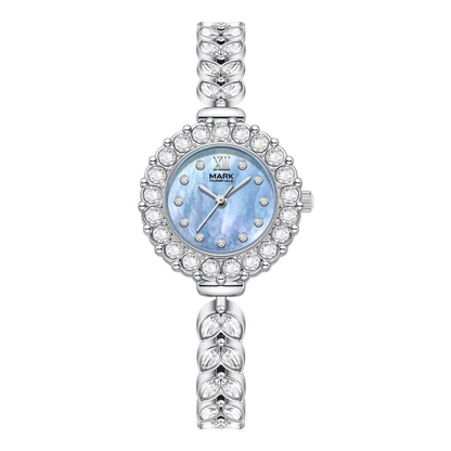 Silver watch with a blue face and crystal embellishments on a white background