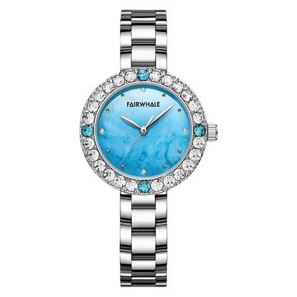 Silver watch with a blue face and gemstone accents on a white background
