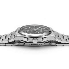 Silver watch with a detailed face on a white background