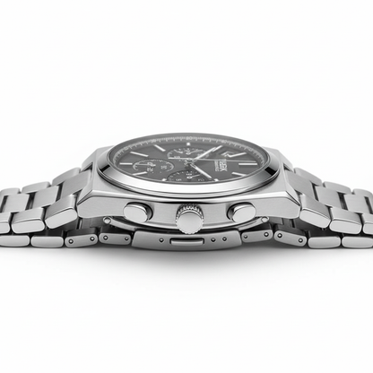 Silver watch with a detailed face on a white background