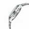 Silver watch with a detailed band on a white background