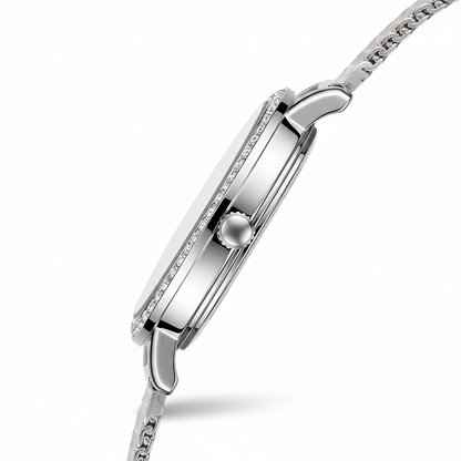Silver watch with a detailed band on a white background