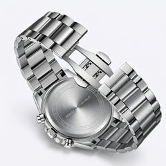 Silver watch with a detailed face on a white background