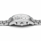 Silver watch with a detailed face on a white background