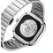 Silver watch with a detailed mechanical back on a white background