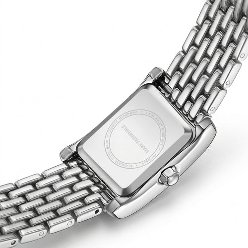Silver watch with a mesh band on a white background