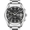 Silver watch with black dial on a white background