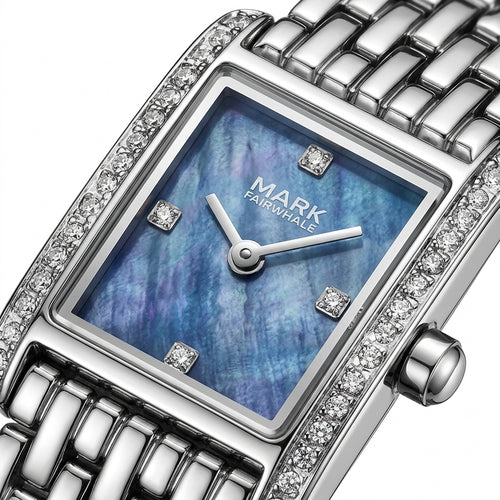 Silver watch with blue face and diamond accents on a white background