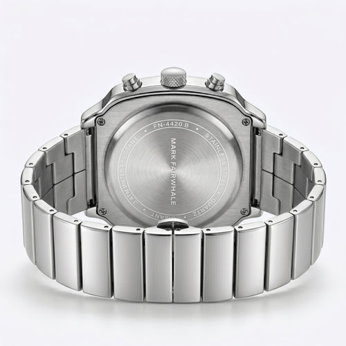Silver watch with brand name on a light gray background