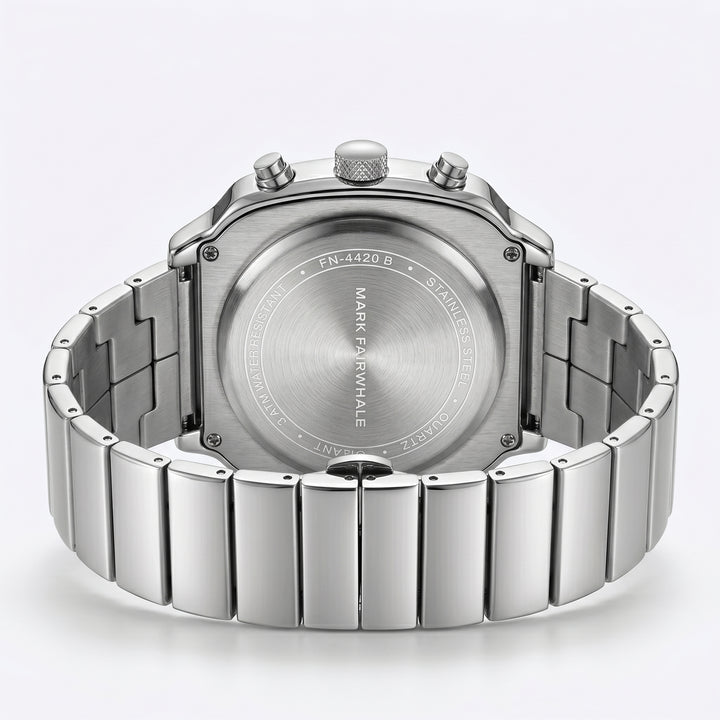 Silver watch with brand name on a light gray background
