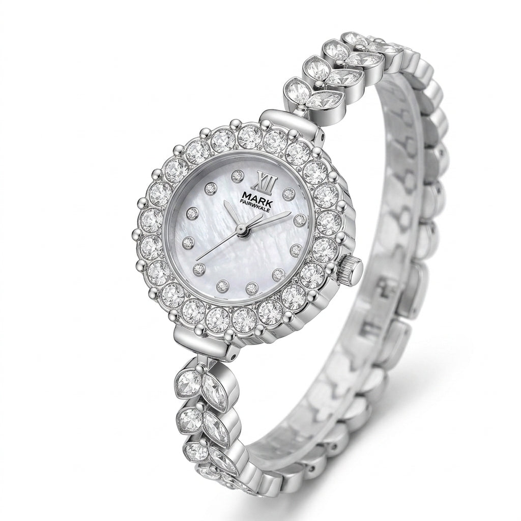 Silver watch with crystal embellishments on a white background
