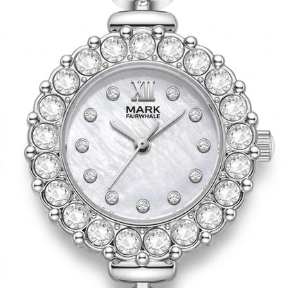 Silver watch with crystal embellishments on a white background