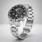 Silver watch with detailed face on a light gray background