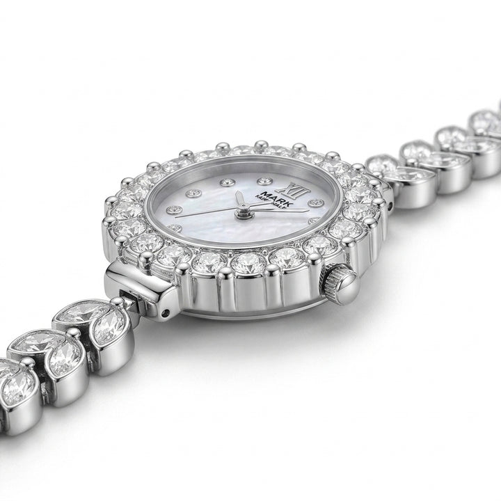 Silver watch with diamond-studded bracelet on a white background