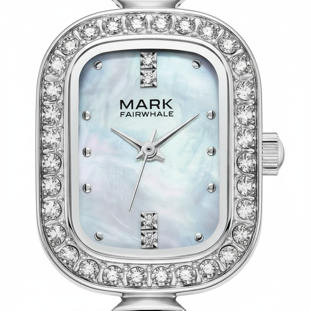 Silver watch with diamond accents and a light blue face, branded 'Mark Fairwhale'.
