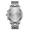 Silver watch with engraved design on a white background