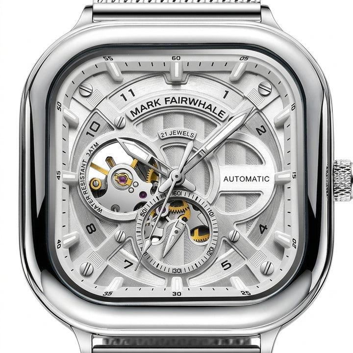 Silver watch with intricate mechanical details on a white background