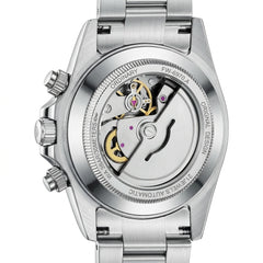 Silver watch with mechanical components on a white background