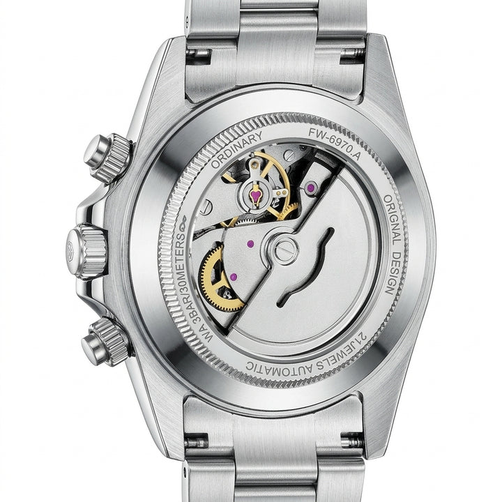 Silver watch with mechanical components on a white background