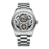 Silver watch with mechanical components on a white background