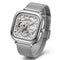 Silver watch with mesh band on a white background